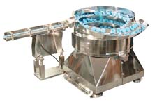vibratory feeders for medical device parts and clean room environments